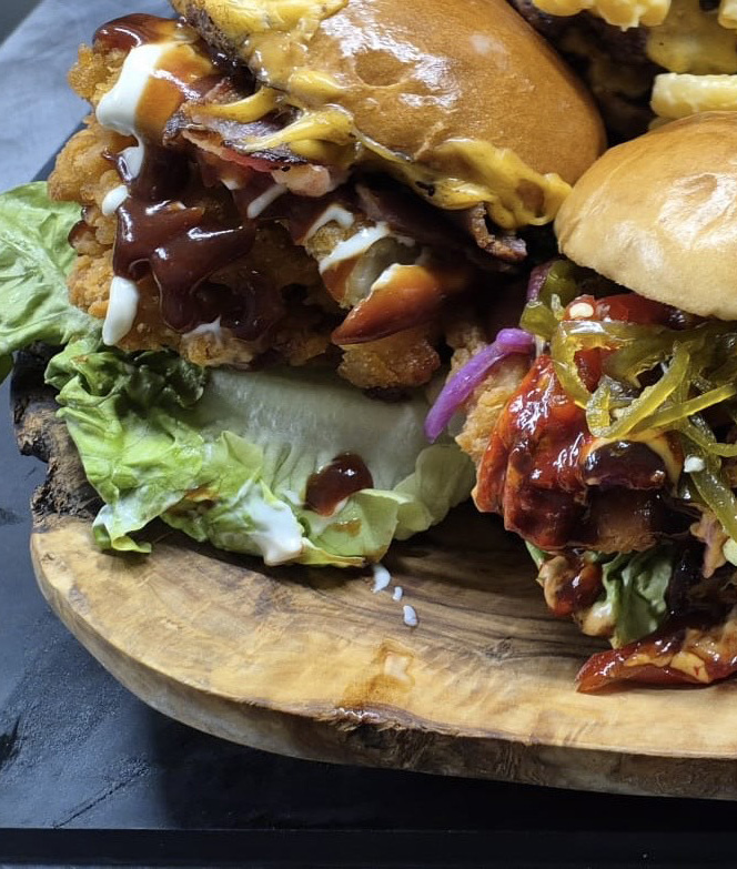 Close up of burgers on a table